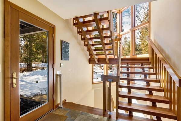 A dozen windows share the outside with you while walking upstairs. Fabric baby gates roll up when not needed at top and bottom of stairs. See left side of picture. Bring stronger protection if desired.