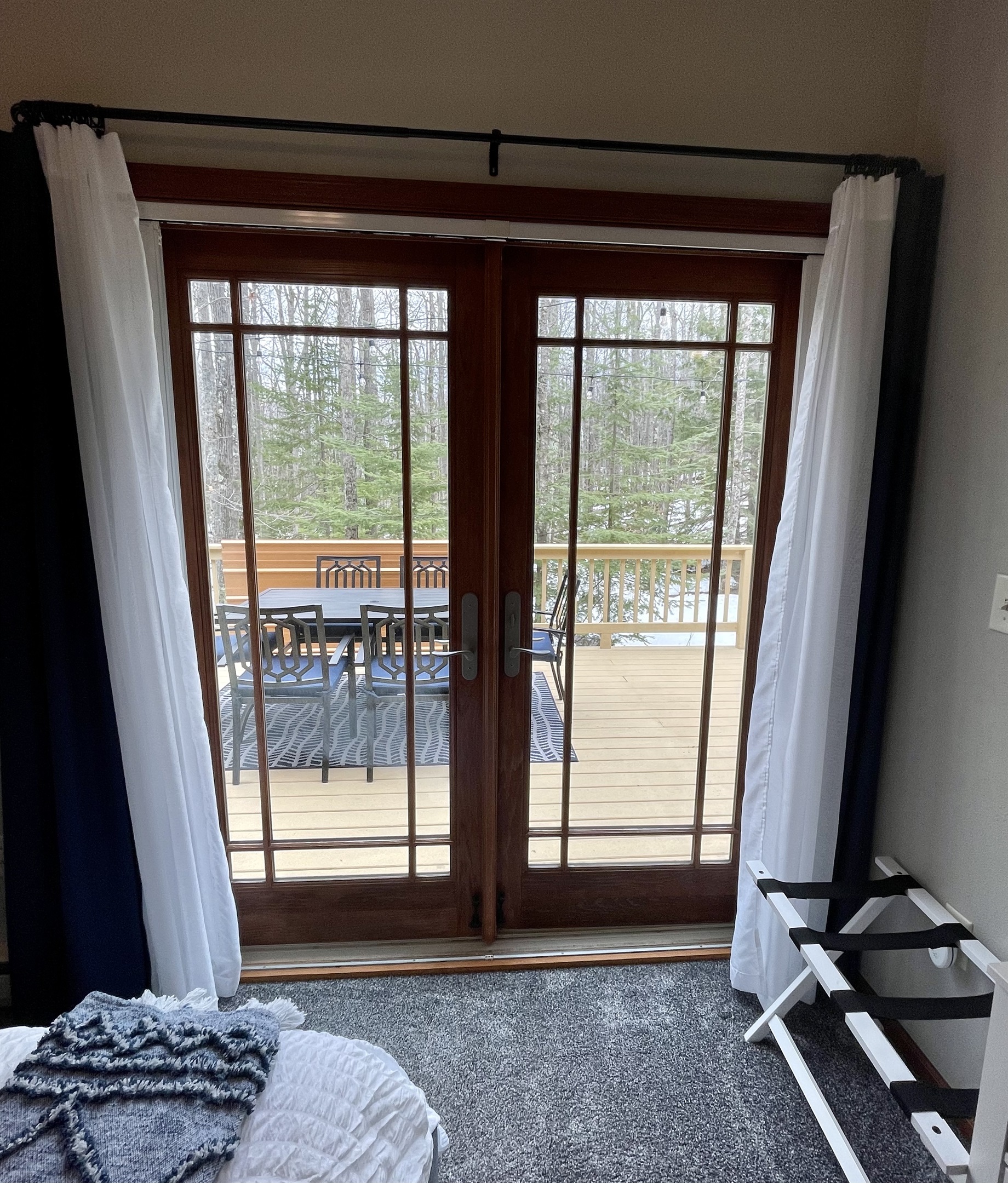 French doors to the back deck out of master queen bedroom 