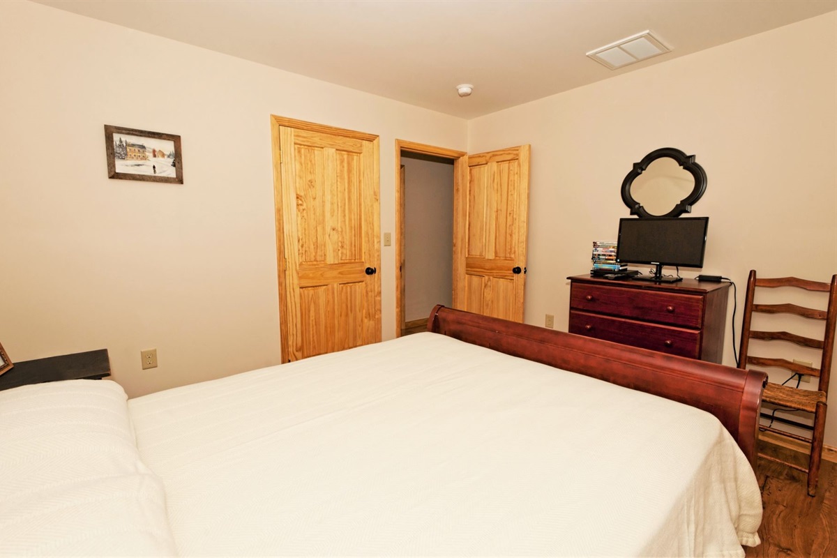Master bedroom with a queen bed
