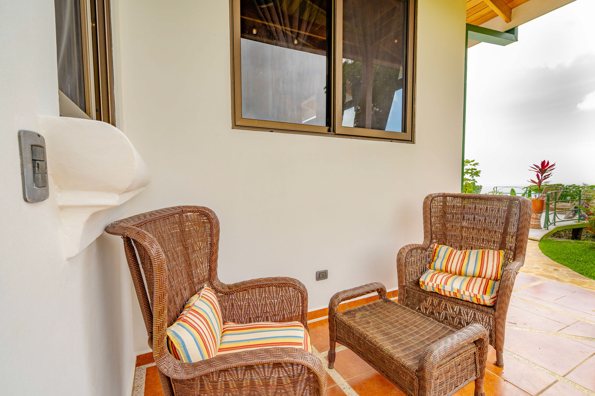 Sitting area with natural light and garden views