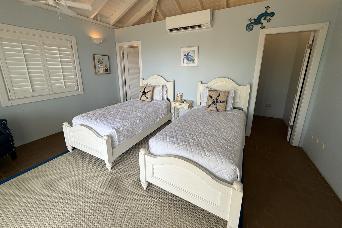 Two comfortable twin beds make this room perfect for family or friends.