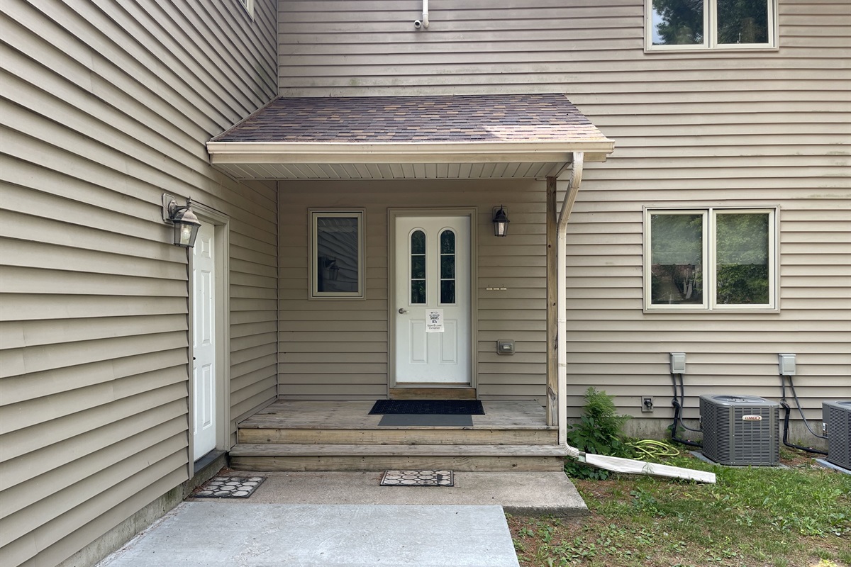 Entrance door. Go upstairs to right