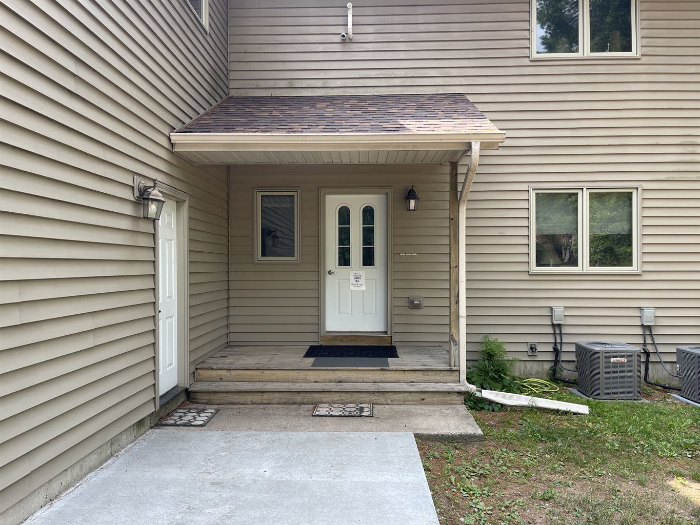 Entrance door. Go upstairs to right