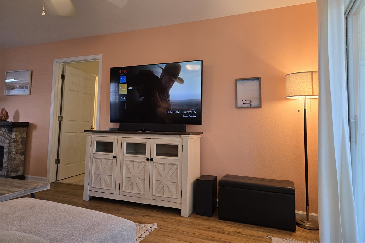 Mounted Flat Screen TV Set Up with Soundbar