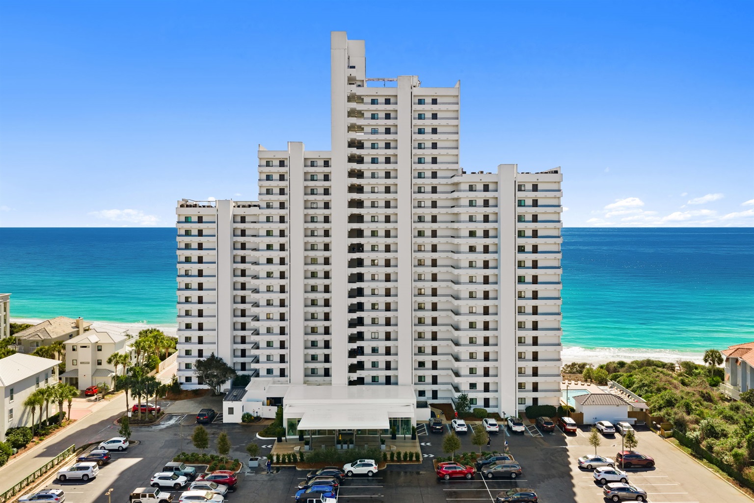 Welcome to One Seagrove Beach. This majestic white building can be seen before you even arrive