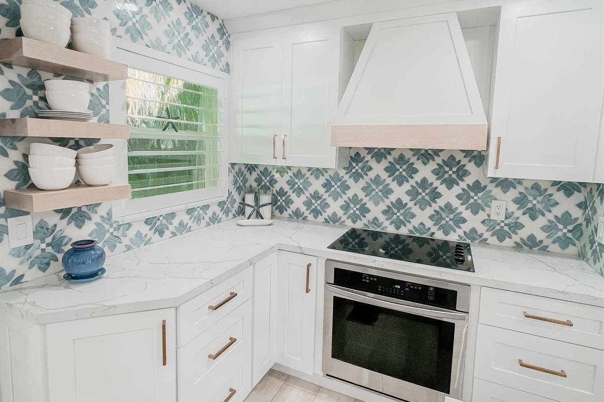 A chef-inspired kitchen with modern appliances and clean design.