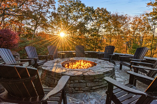 Huge firepit with ample seating and stunning views.