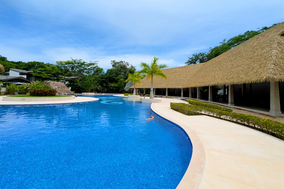Large covered areas around the large community pool