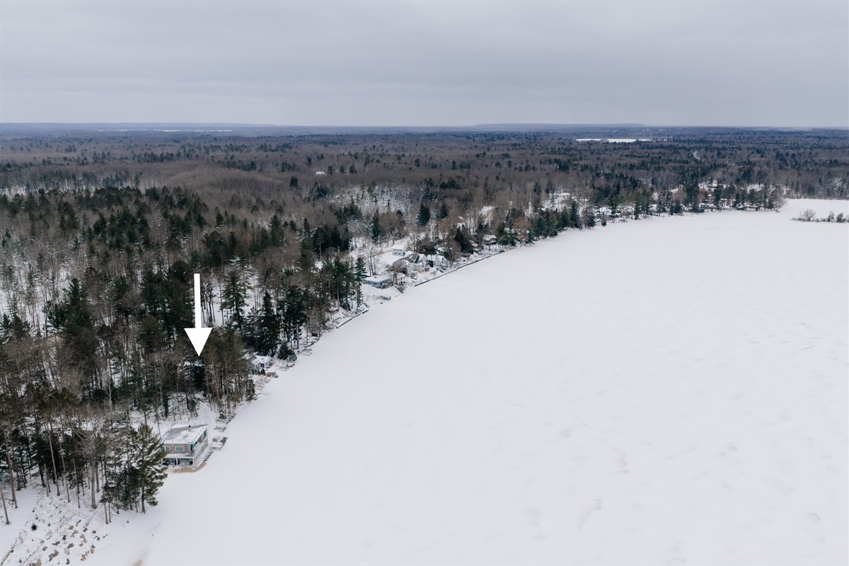 Overhead view of the home set along the shores of Long Lake
