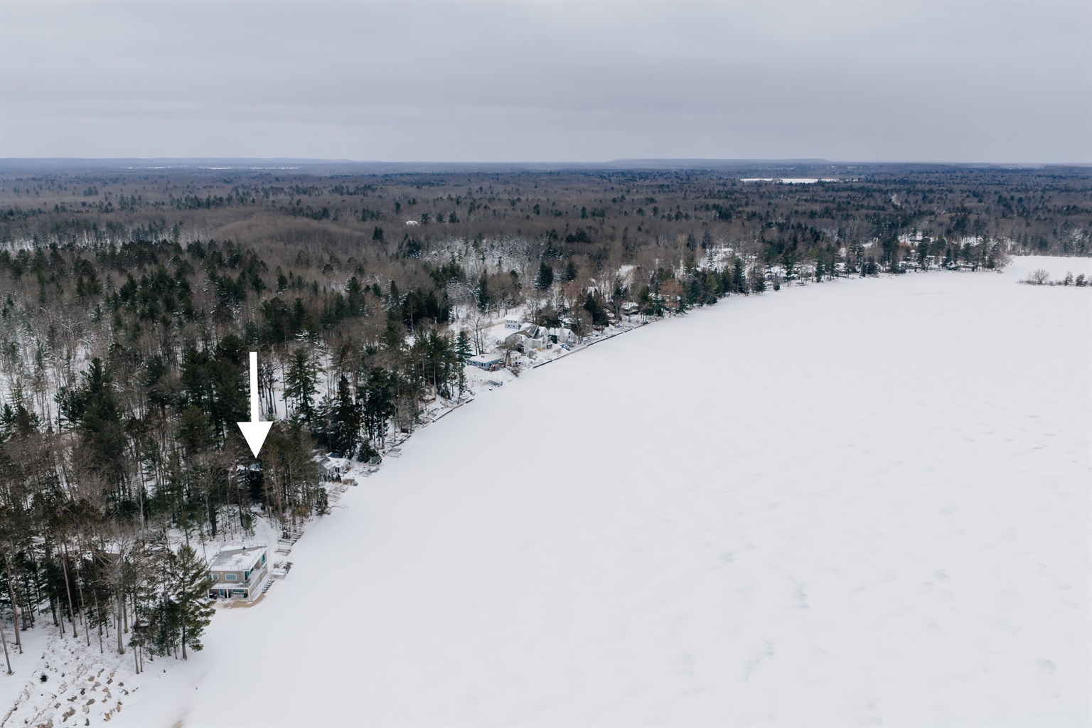 Overhead view of the home set along the shores of Long Lake