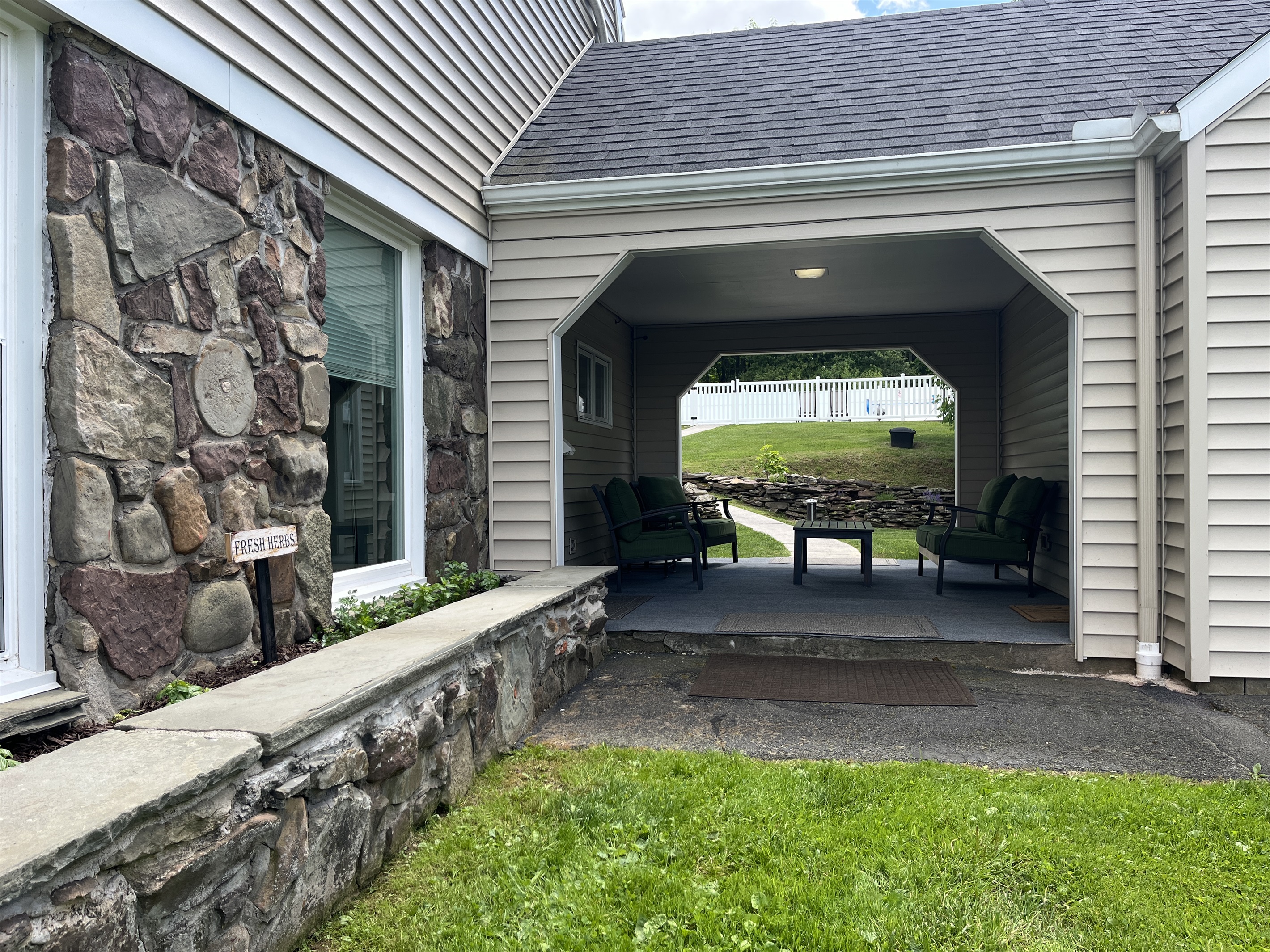Breezeway to pool and Fresh Herb bed