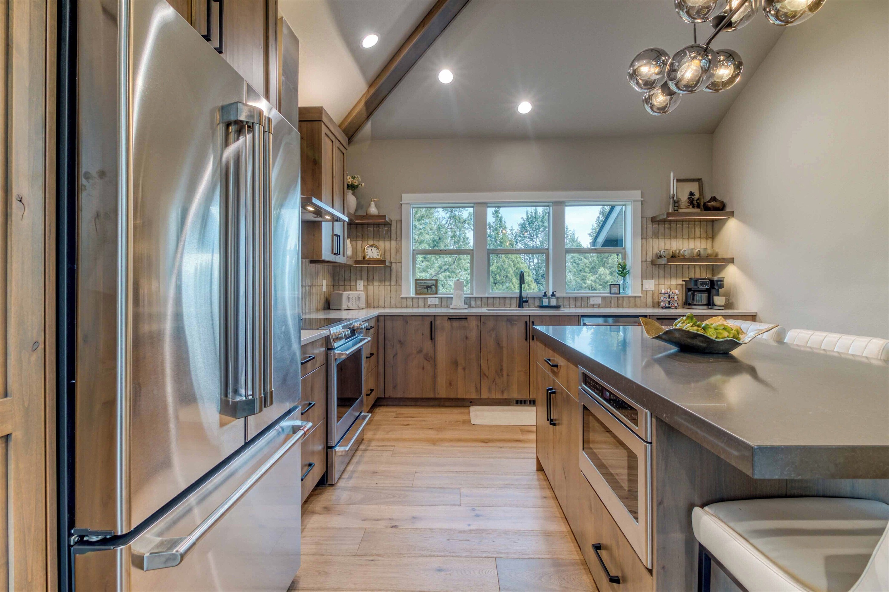 A chef's dream kitchen with large entertaining island, seating and prep space.