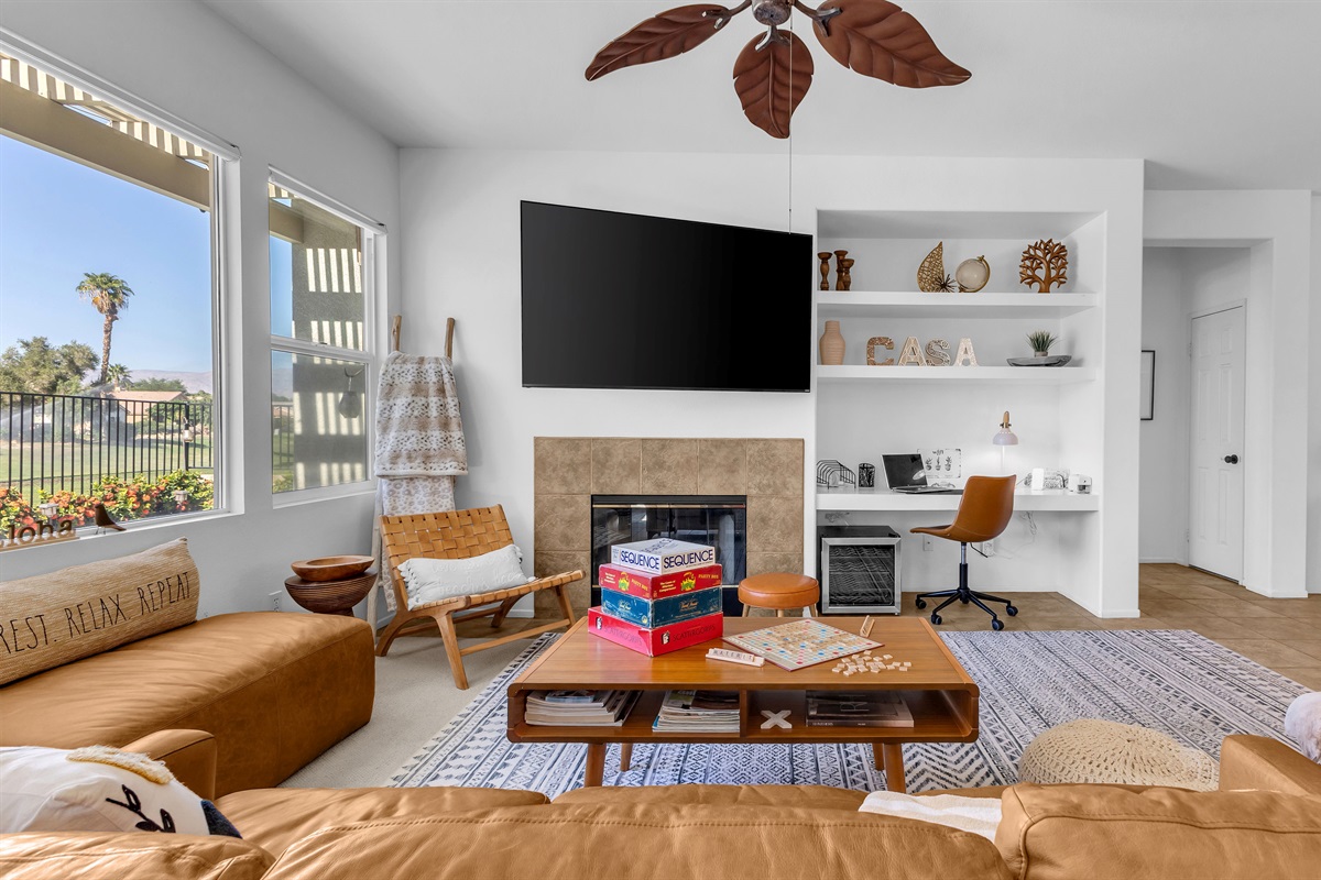 Sleek built-in shelving and home office nook blend design and practicality for extended stays.