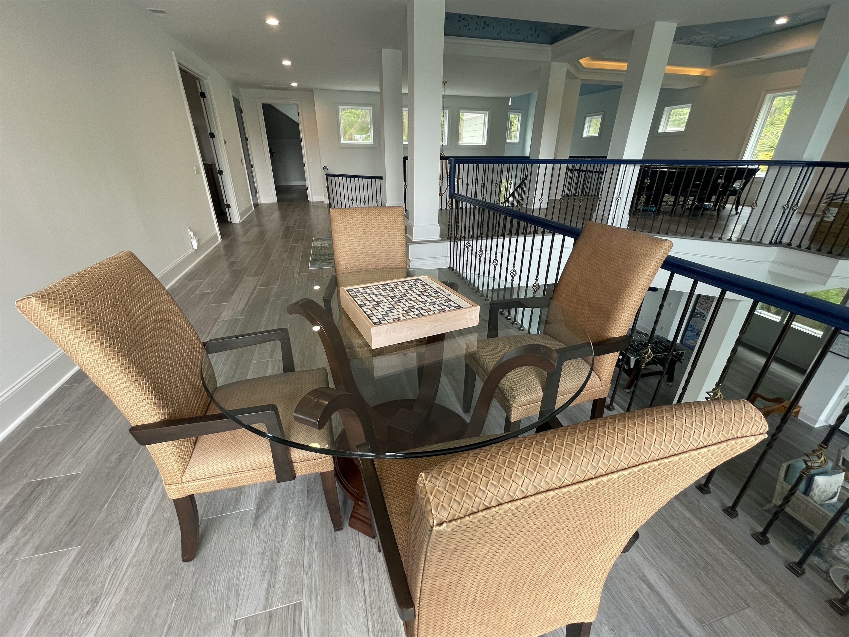 2nd game table w/luxury Scrabble & Monopoly boards. Can you spell “Game Night”?