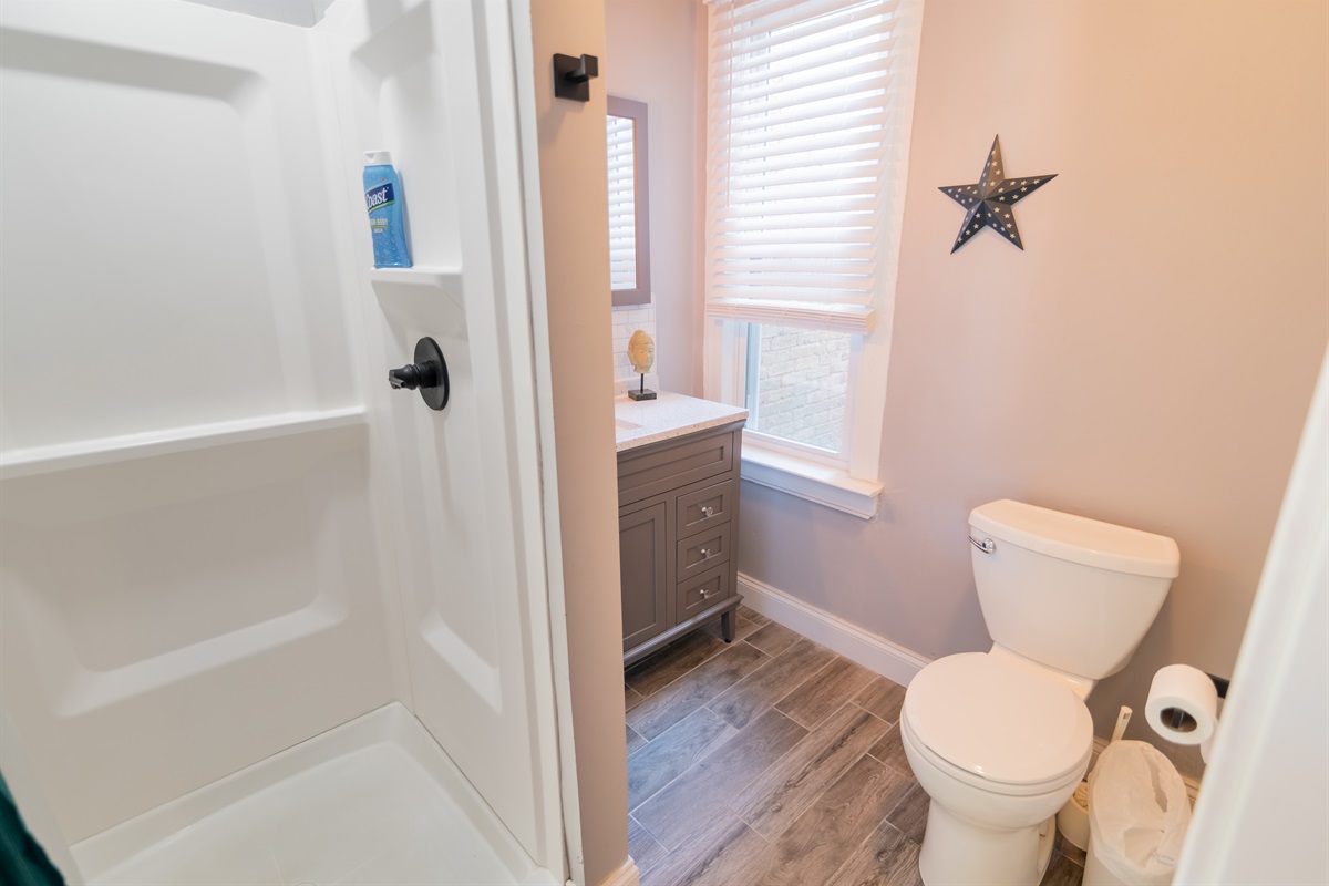 Clean and renovated bathroom with walk in shower