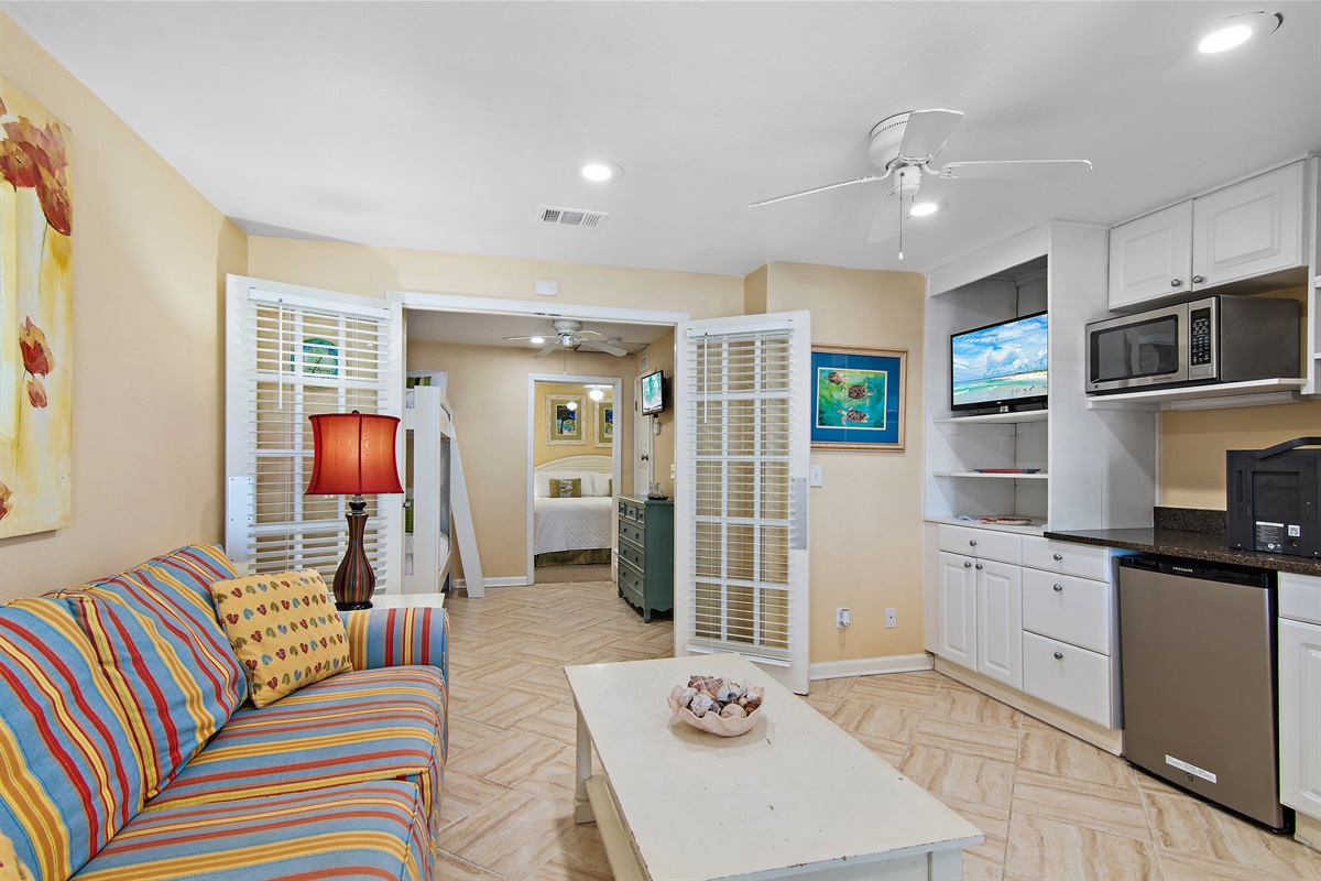 The 1st Floor features another Living Room with a Smart TV, Multi-, a Kitchenette, and Patio Access - Great for the Kids!