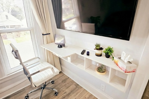 Work or play. Work space and oversized smart TV. 