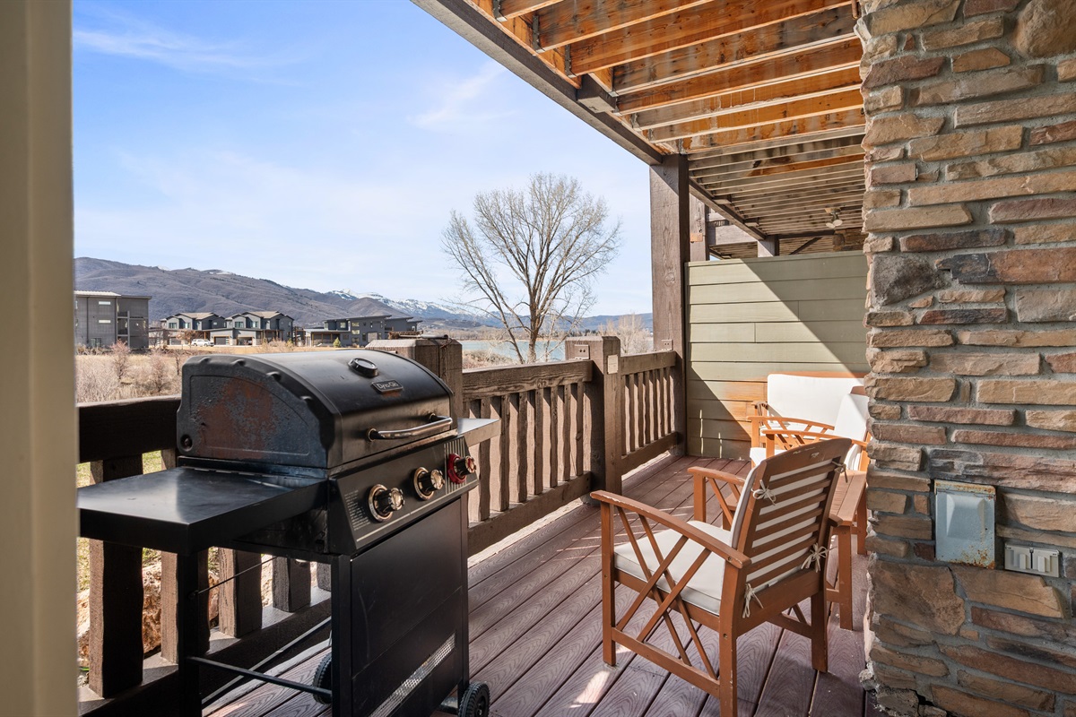 Private deck with BBQ grill—perfect for outdoor dining and summer evenings.