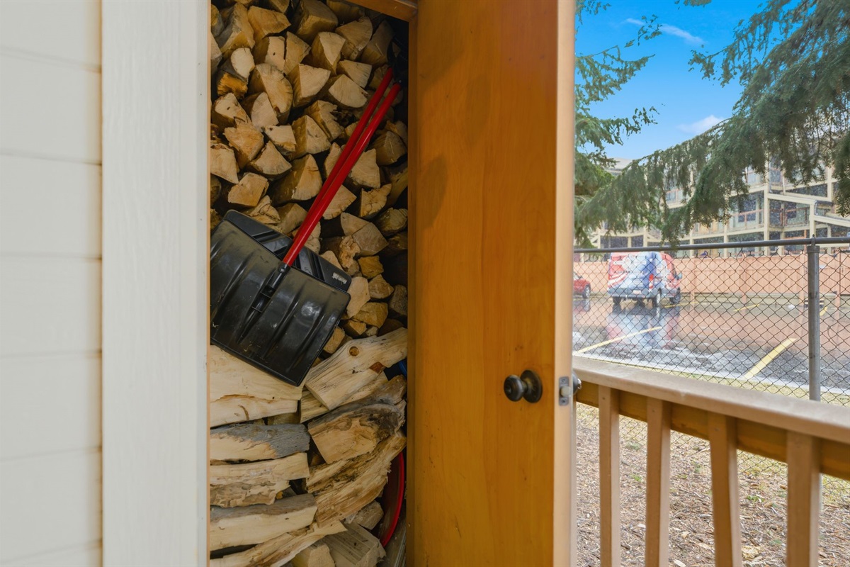 Firewood available for guest use in the patio storage room.