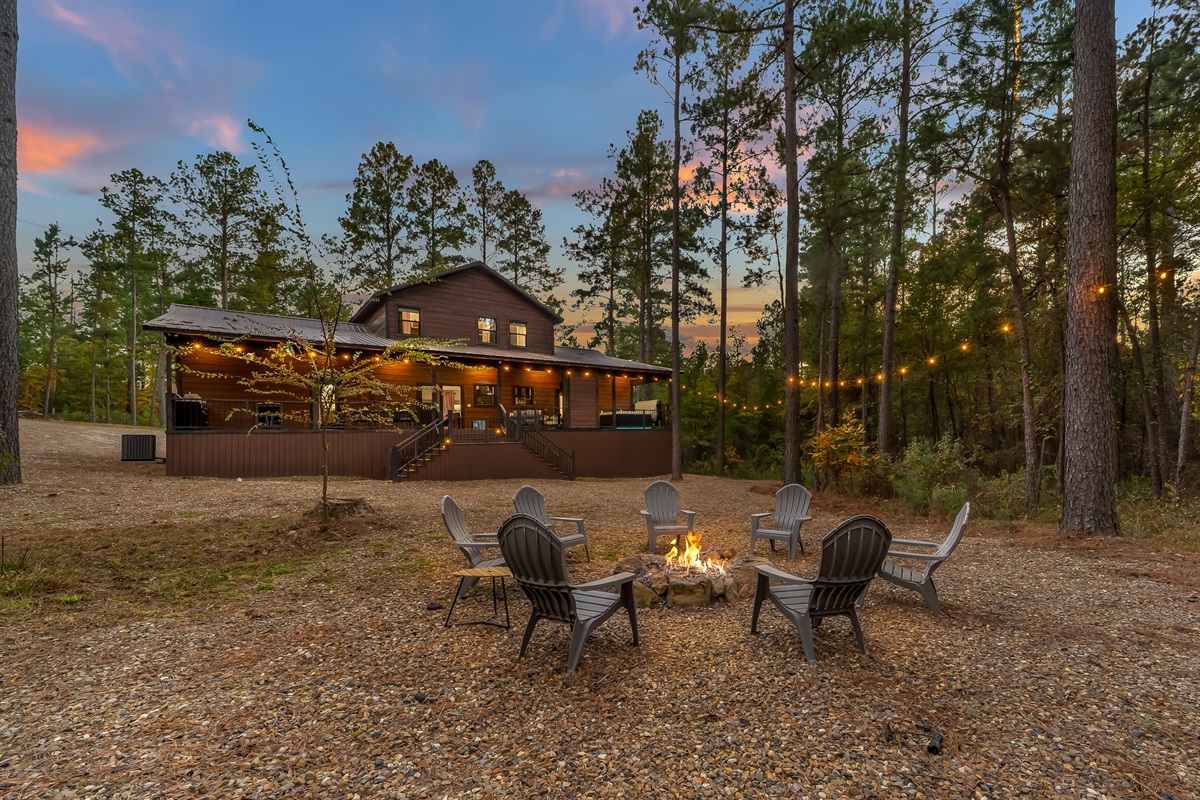 Your own campfire haven under string lights. Perfect for sunsets, stargazing, and late night conversations.