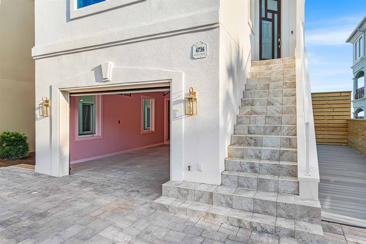 Garage and Stairway to Second Floor Front Door