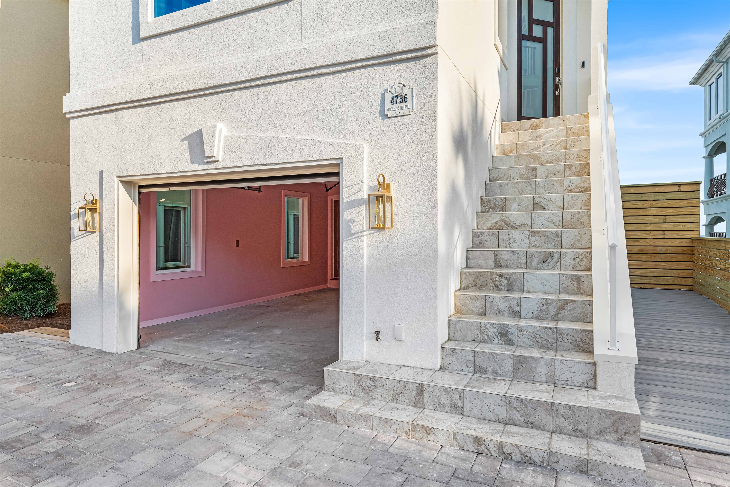 Garage and Stairway to Second Floor Front Door