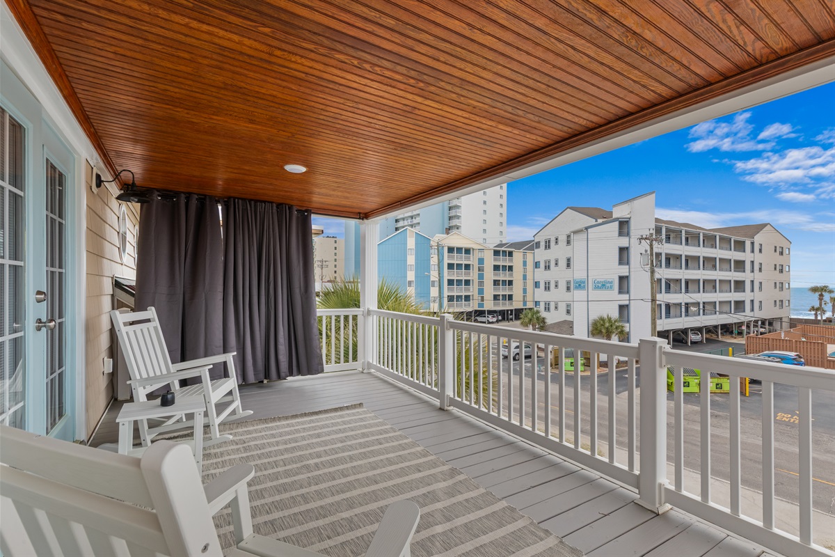 Enjoy coffee with your soulmate on the private balcony with ocean and beach views. 