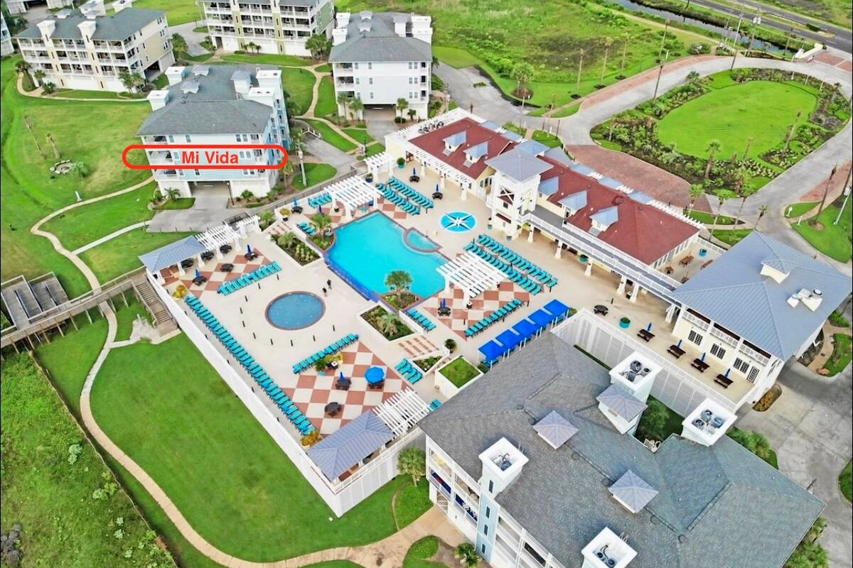 The Beach Club has a large pool, a hot tub, a separate kids pool, and several gas grills available.