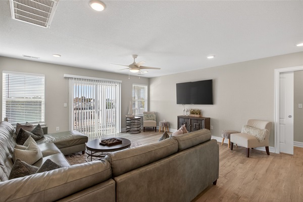 3rd floor living room with balcony for sunset view