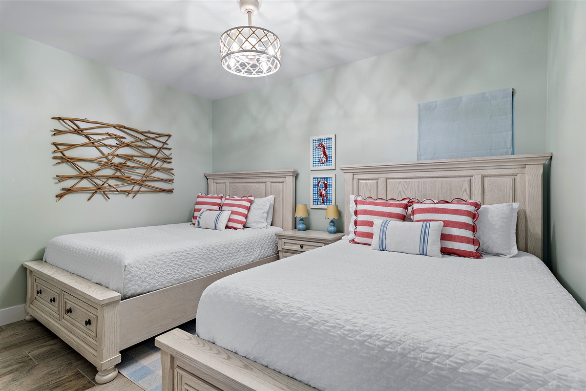 Guest Bedroom 1: Two Queen Beds, Smart TV, Private Remodeled Bathroom with Shower Tub Combo
