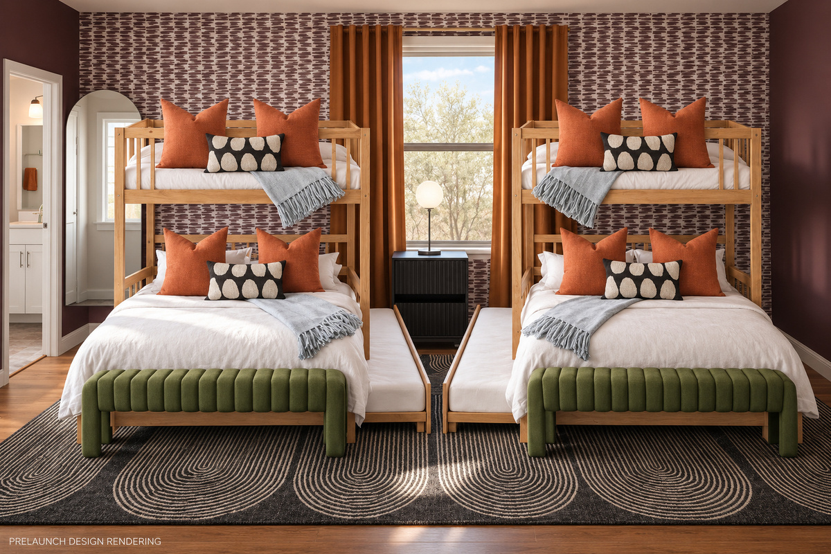 {Bedroom 1 — Bunk Room} Bring the whole sleepover crew. Two sets of queen-over-queen bunks with trundle beds accommodate up to 10, with an ensuite bath and soaking tub for winding down after a full day of Firebird fun.