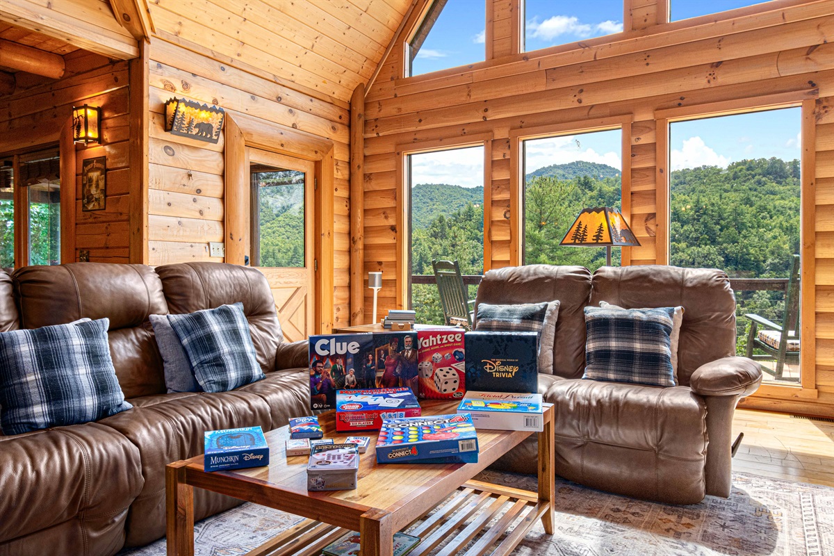Main Level Living Room: Scenic views and game nights await in this inviting space with natural charm!