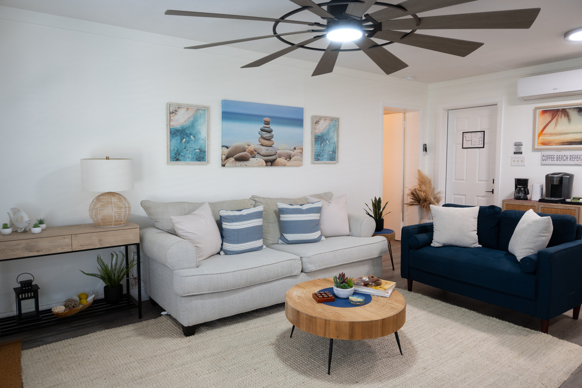 Cozy sofas and a live-edge coffee table for lazy beach evenings