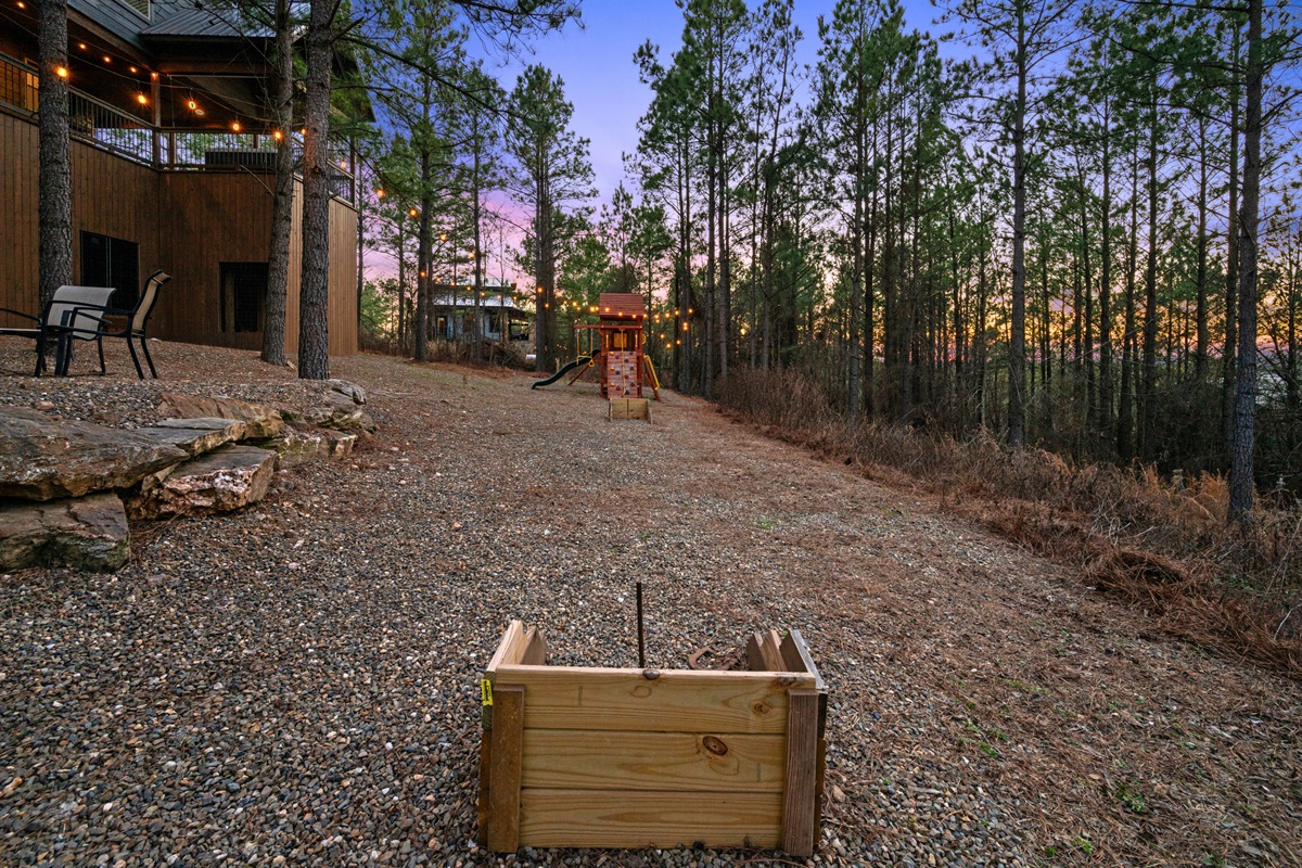 With plenty of open space around the play area, this outdoor setup is great for family time, games, and enjoying the fresh air together.