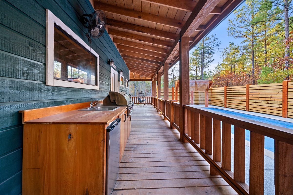 With an outdoor kitchen right beside the pool, you can grill, chill, and keep the fun going without ever heading indoors.