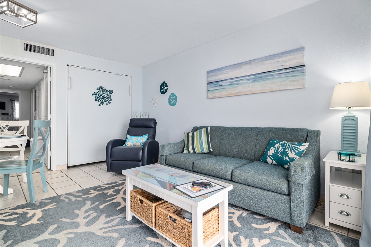 Bright, breezy living space with extra beds fold away for daytime comfort.