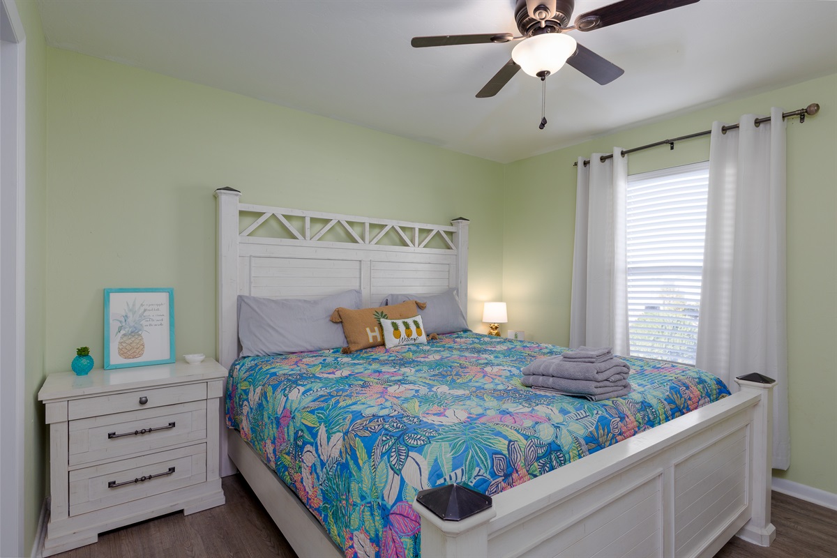 Bright and cozy King bedroom with coastal charm