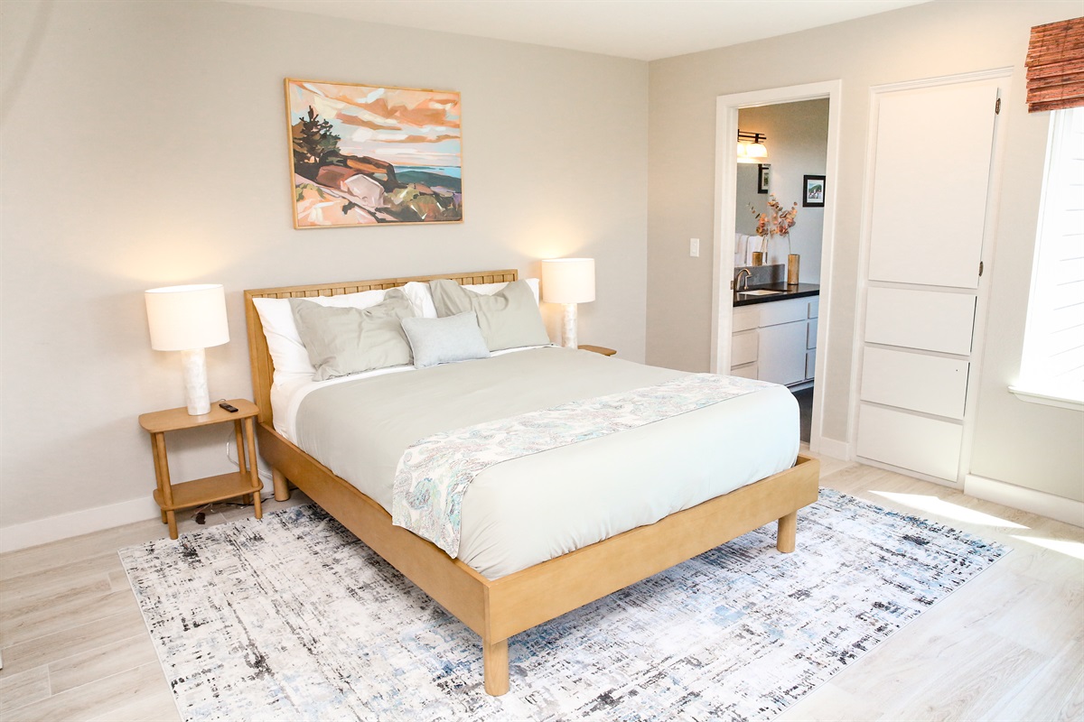 Pines by the sea ensuite bedroom with queen bed