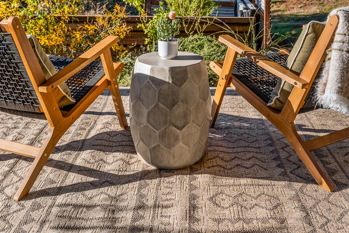 Thoughtfully styled outdoor seating area for two, designed for relaxing and enjoying the Sedona atmosphere.