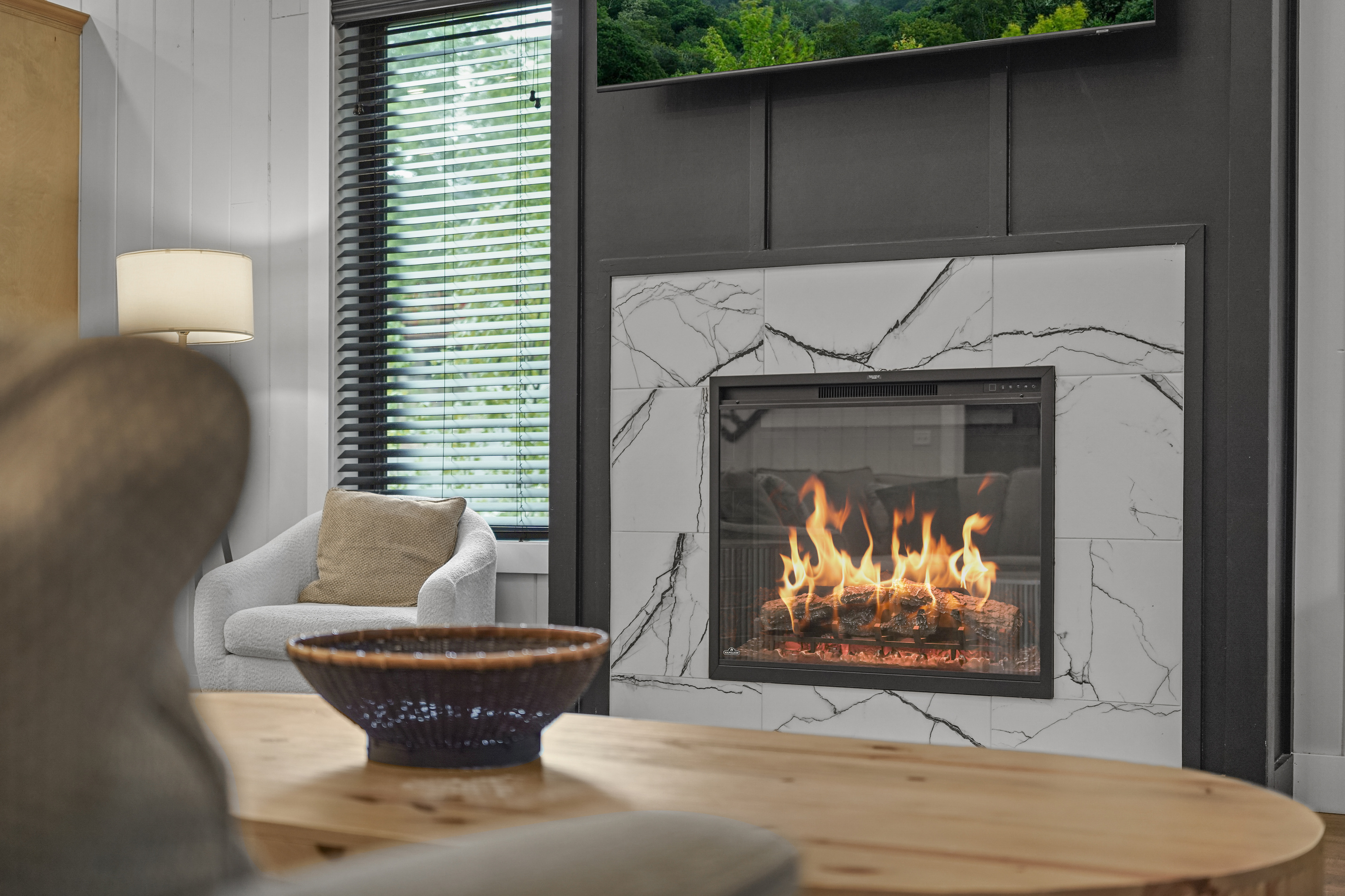 Living room - fireplace, fire lit