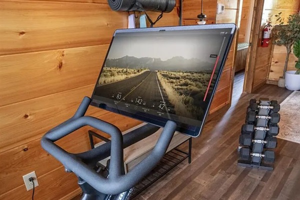Keep your fitness routine going on vacation with the private Peloton bike and yoga space at Marigold Cabin in Pigeon Forge, TN. Whether you're logging miles on the Peloton or stretching out with a morning yoga session.