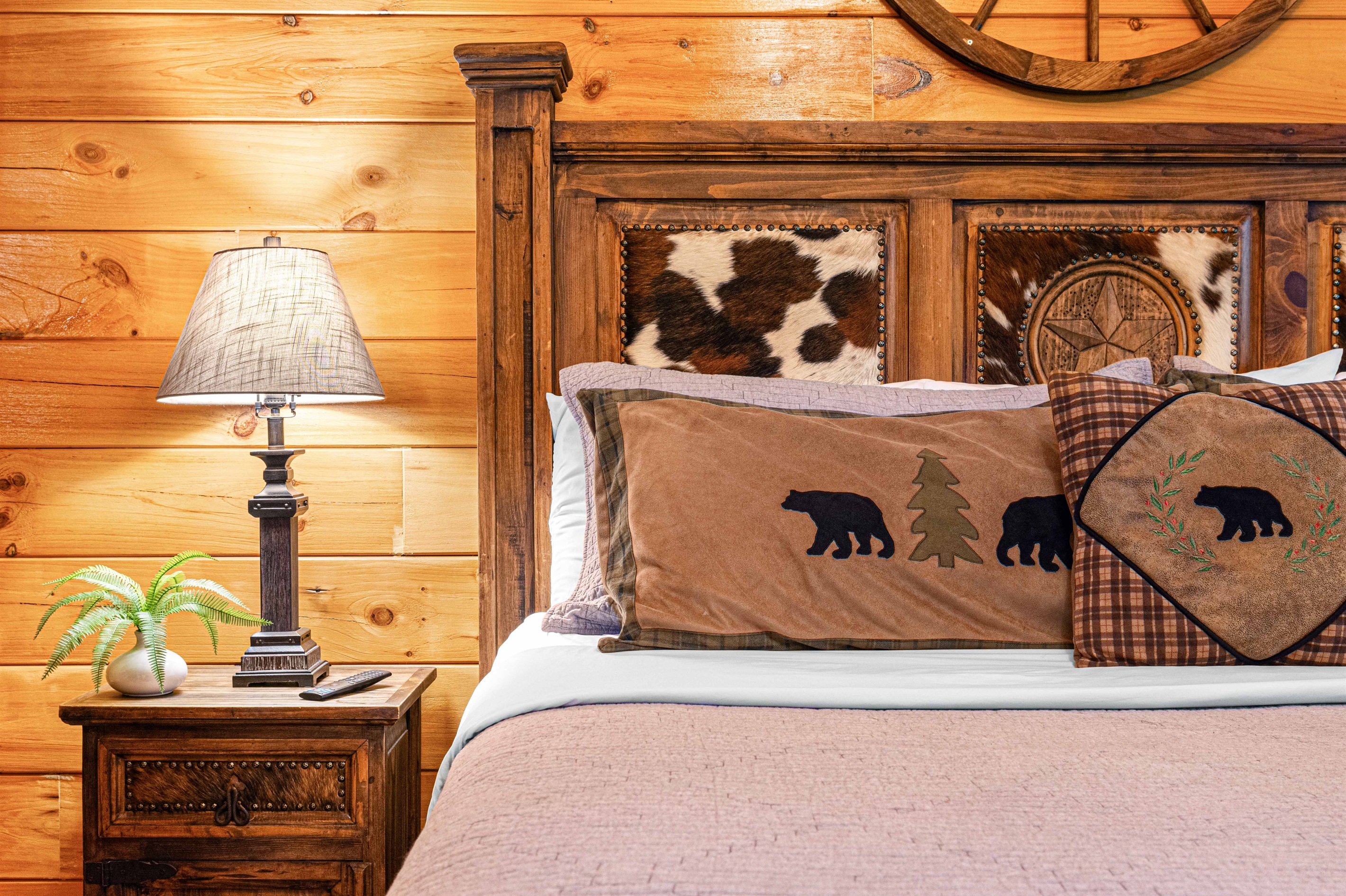 Western charm. Experience the unique style and comfort of this western-themed bedroom.