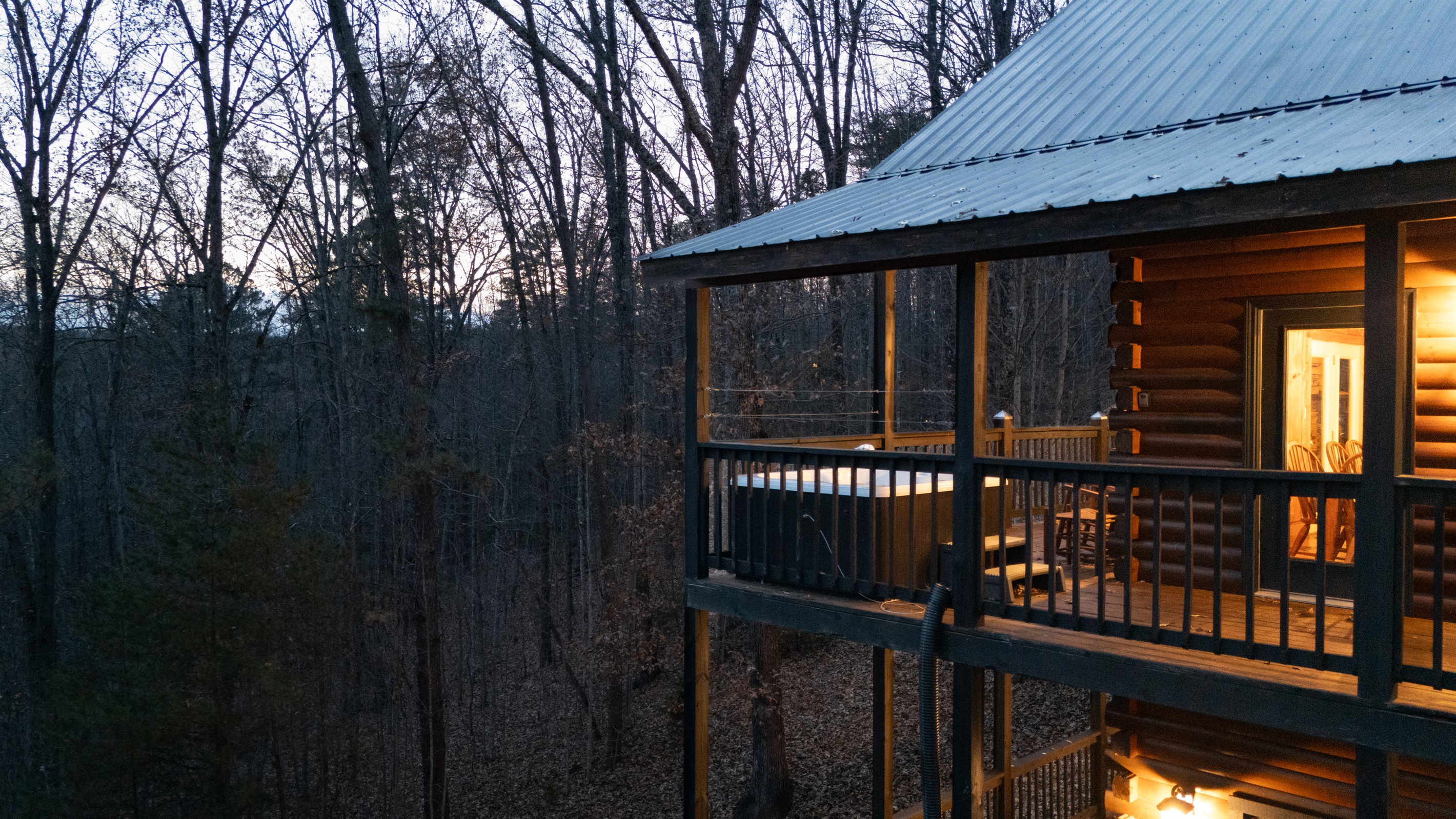 Unwind in the main deck hot tub with amazing Smoky Mountain views—your front-row seat to pure relaxation.