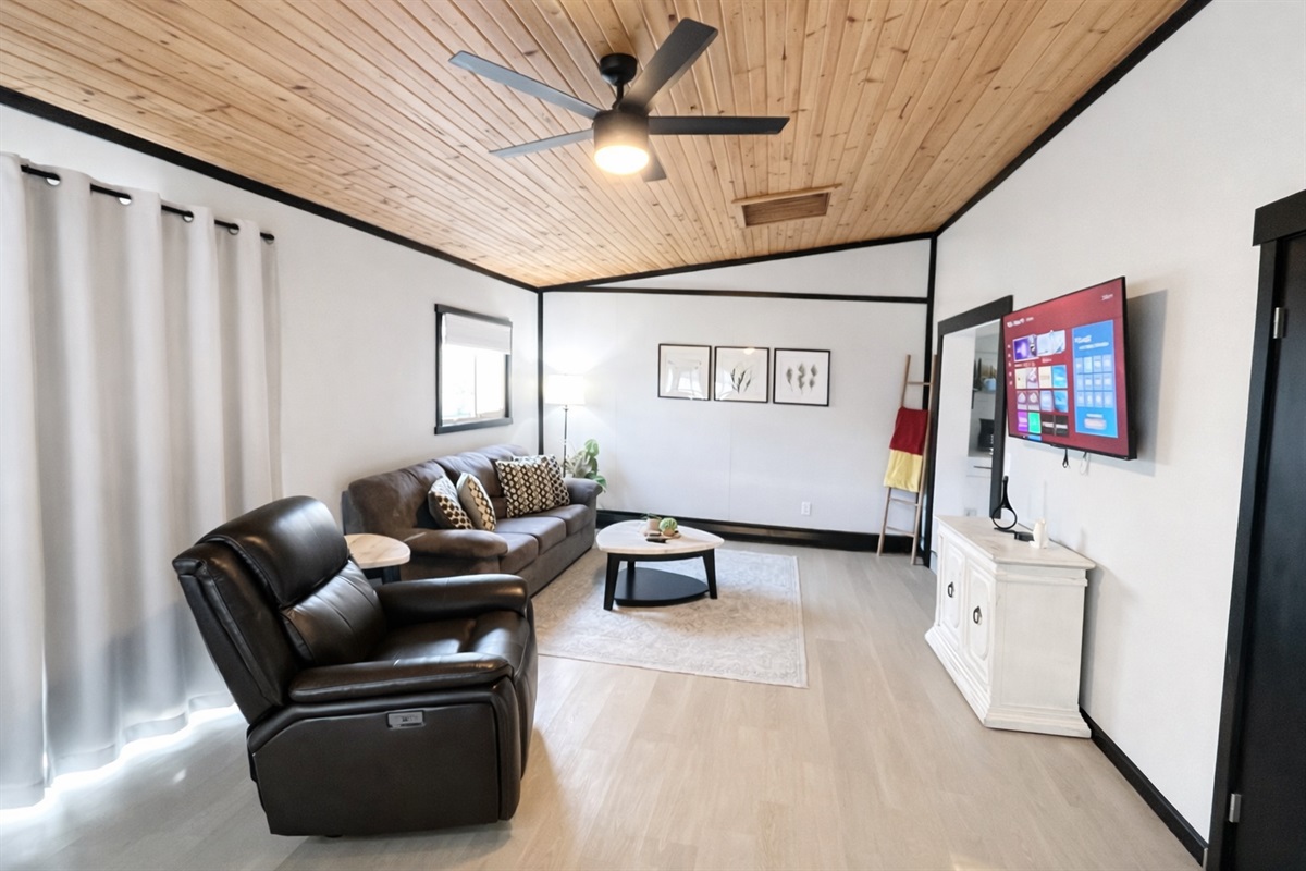 Relax and unwind in the cozy comfort of our stylish living room