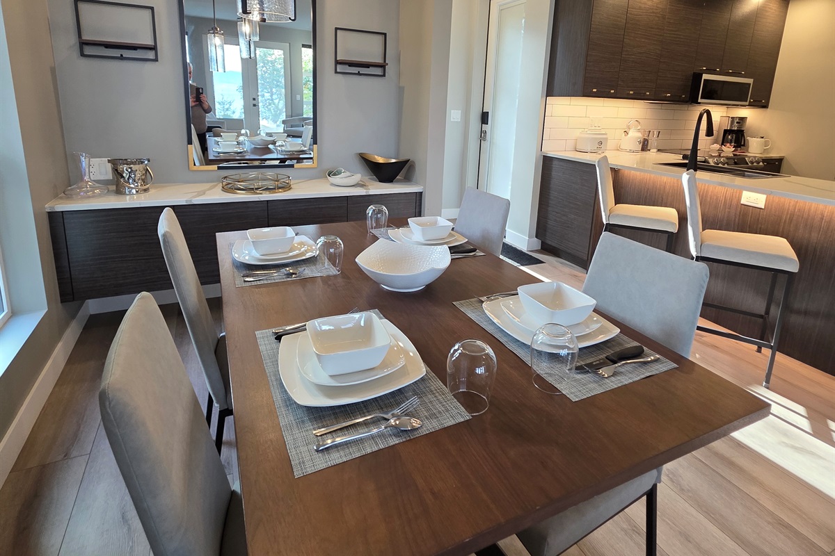 High end dishware that is fully stocked.