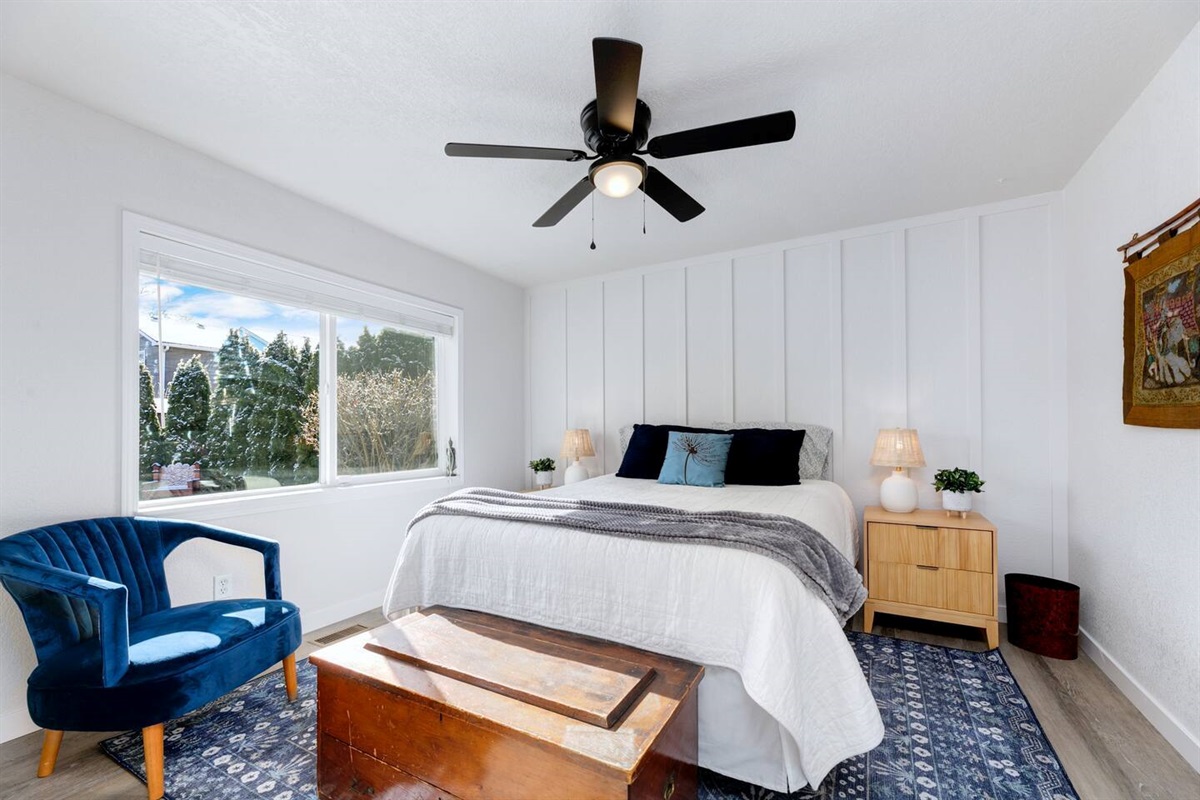 Queen bed.  Downstairs.  Next to full bathroom.