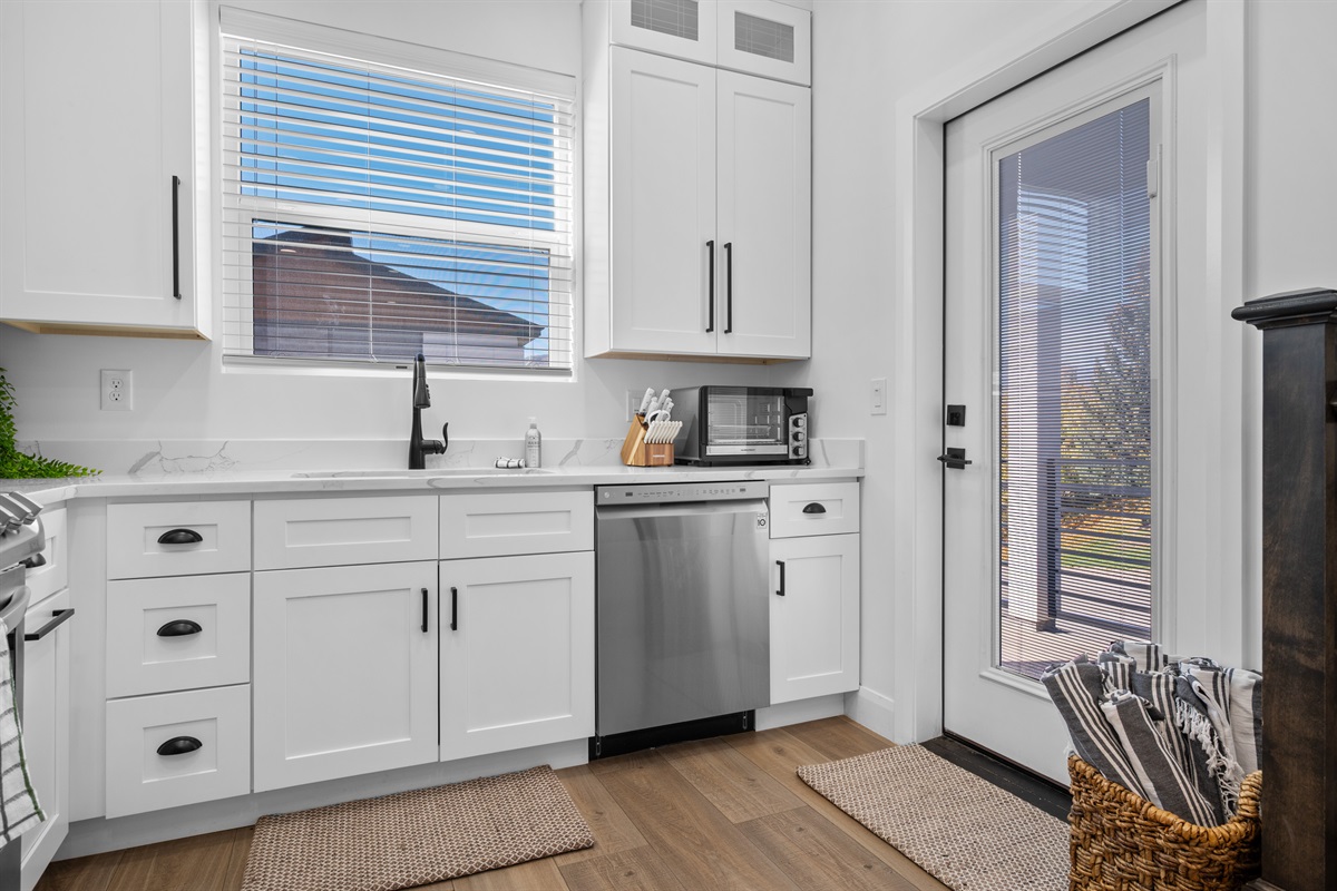 Bright kitchen with ample counter space and a full suite of modern appliances.