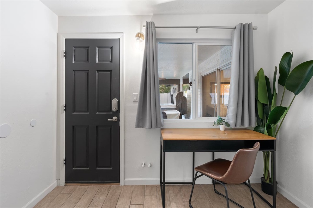 Stylish and functional workspace with natural light—perfect for remote work or planning your Scottsdale adventures.