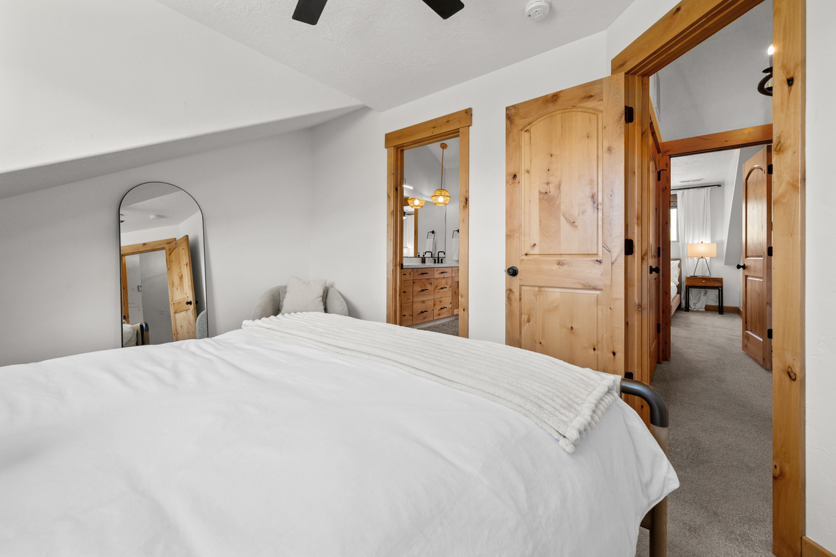 Warm wood accents give the sleeping spaces the character and charm of a true mountain retreat.