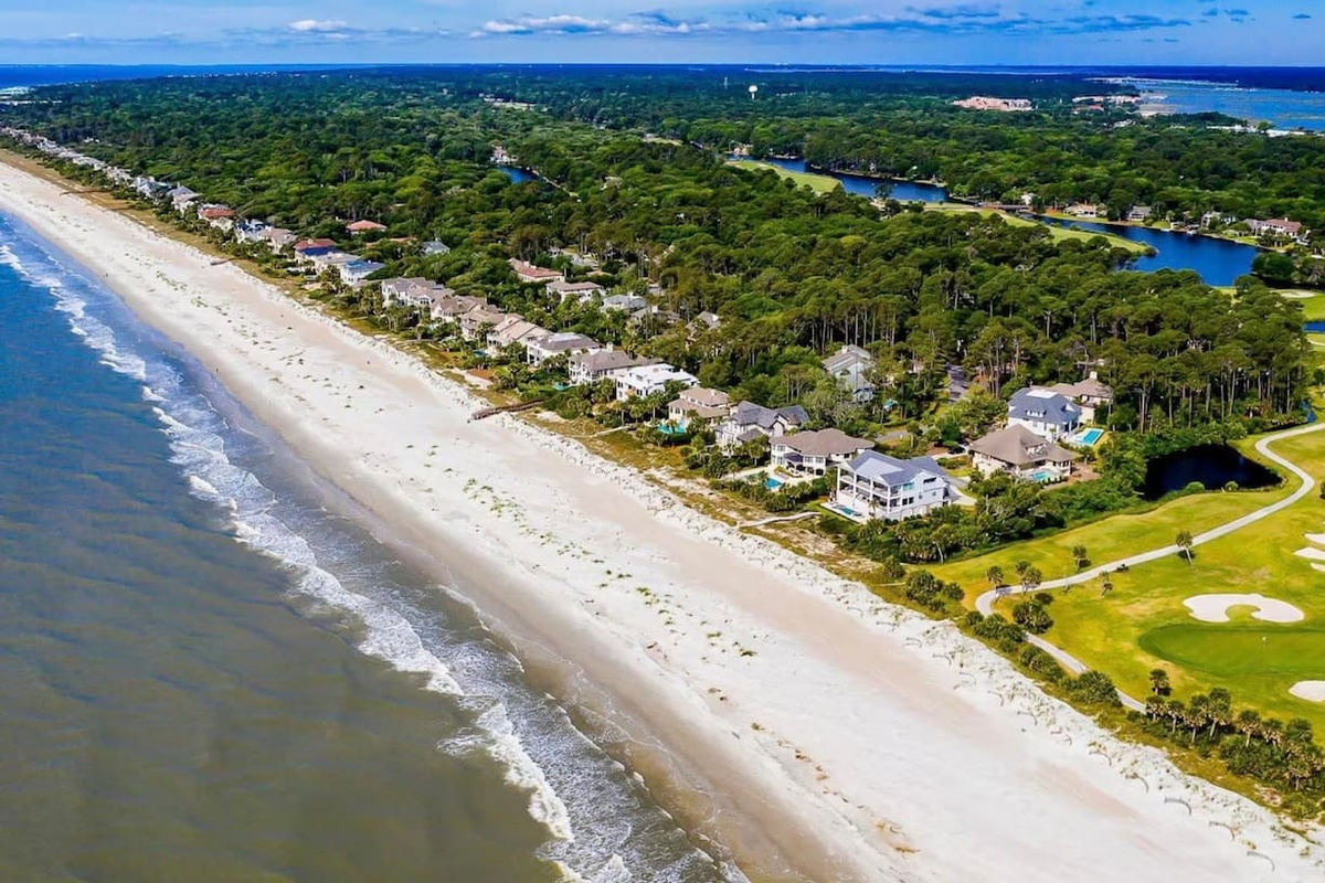 Beachfront and golf course from above